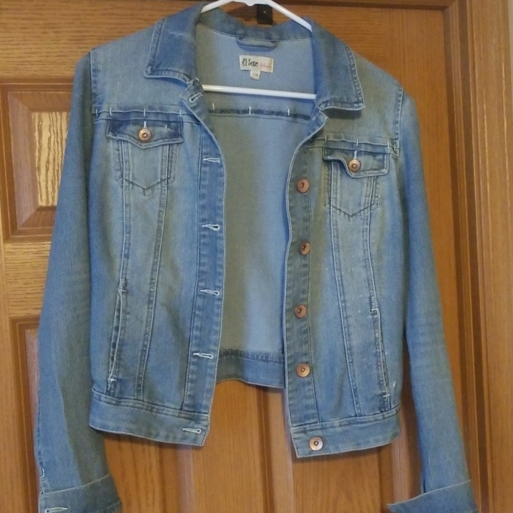 Lightly distressed fitted denim jacket